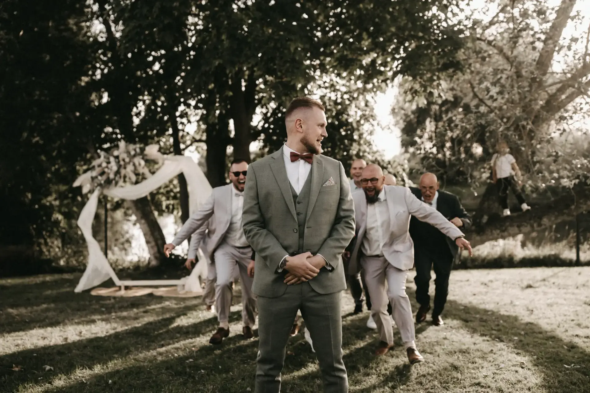 Groom laughing